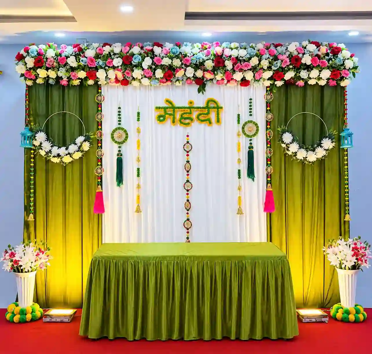 Green Drapes With Floral Mehendi Backdrop